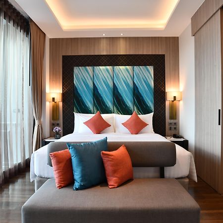 普吉岛芭东海滩天空景观度假村-Sha高级认证 Patong 外观 照片 A bedroom at the hotel